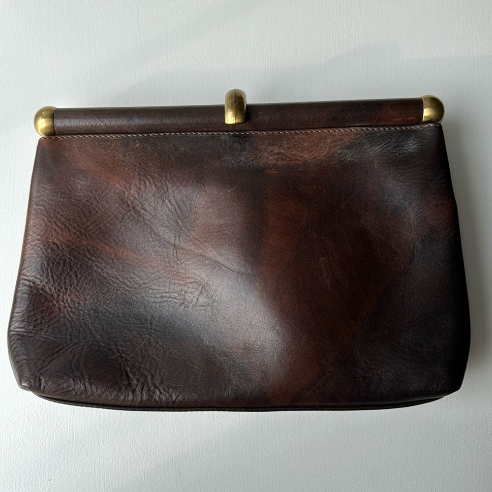 Brown leather clutch